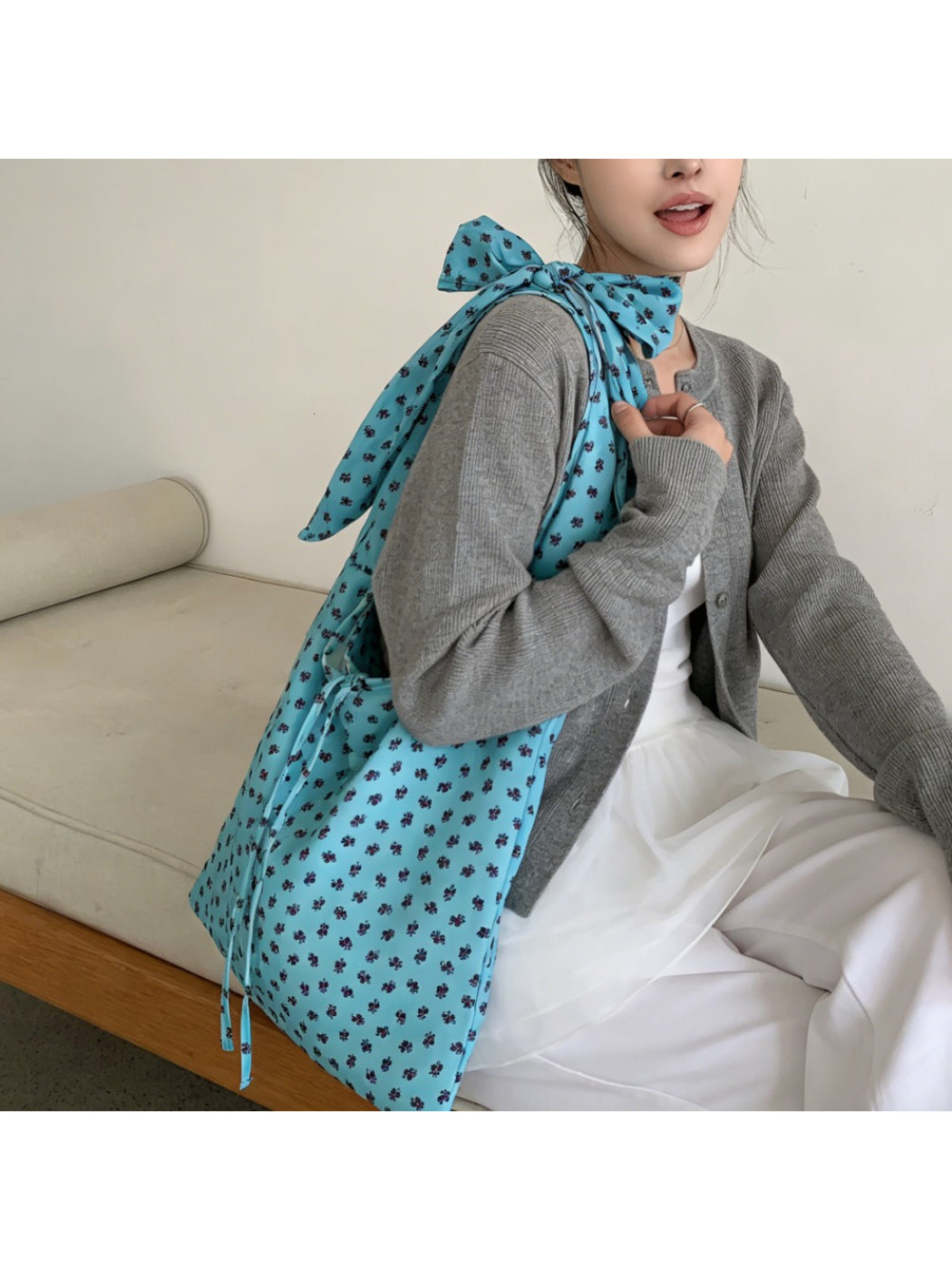 Cosbai floral bow knot shoulder bag styled with matching floral accessories