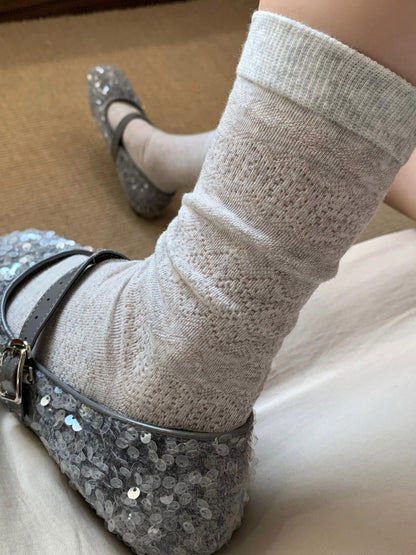 Rufia floral mid-calf socks displayed with focus on colorful floral design and texture