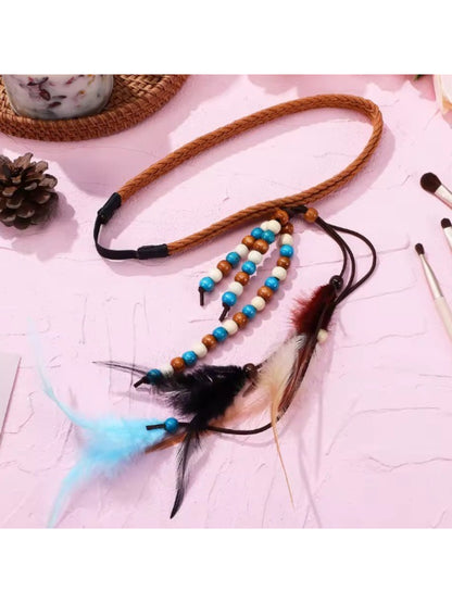 Side view of Hairish boho beaded feather headband highlighting feather and bead design