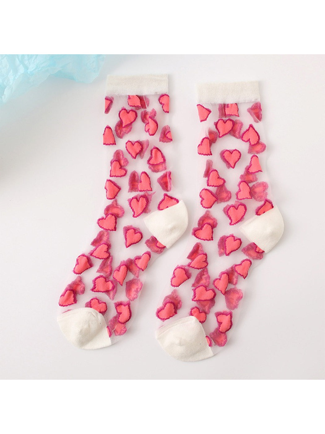 Side view of Rufia Candy Heart sheer crew socks highlighting sheer material