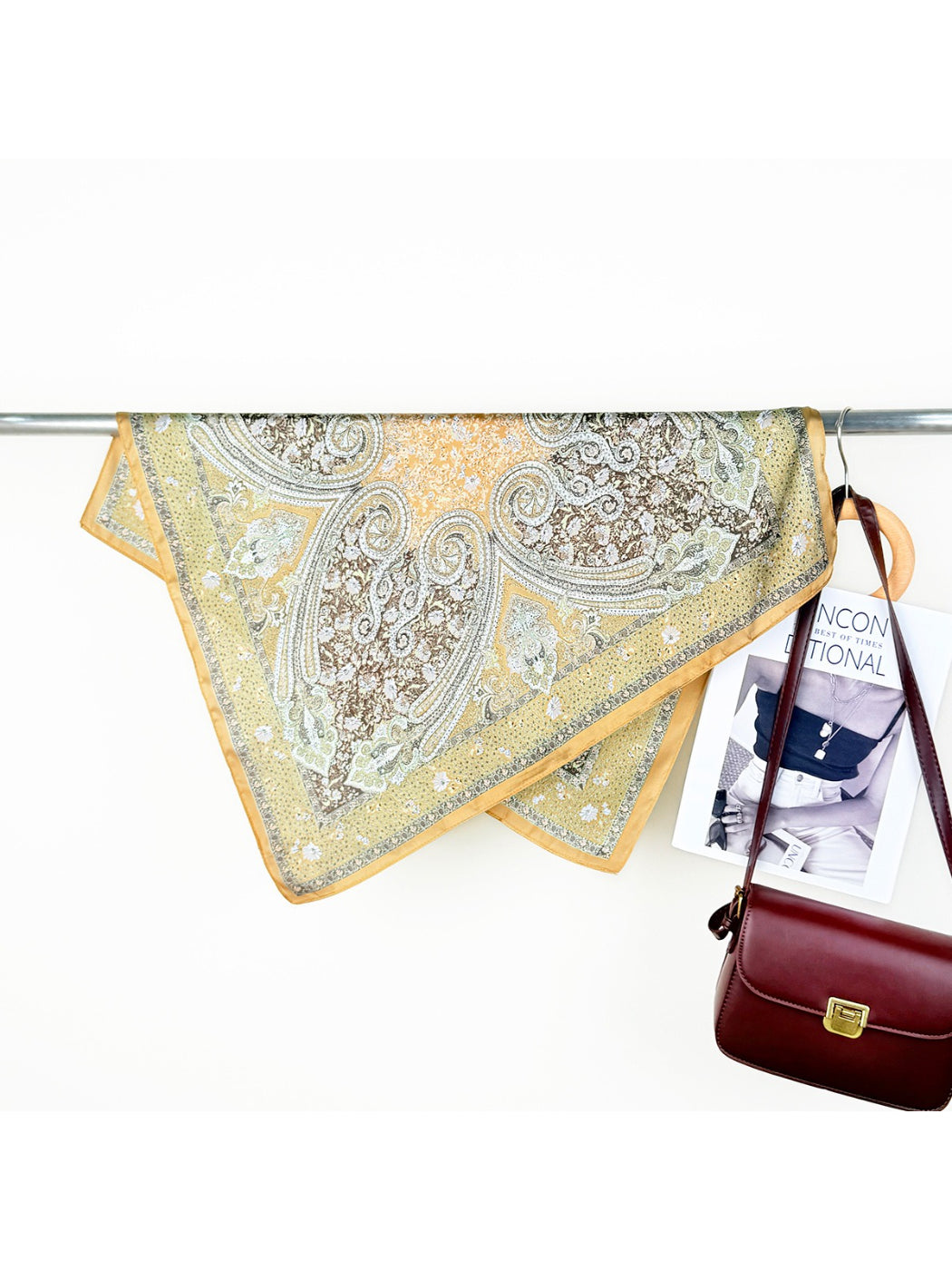 Scarvii Ornate Scroll Square Scarf rolled neatly emphasizing fabric quality and design