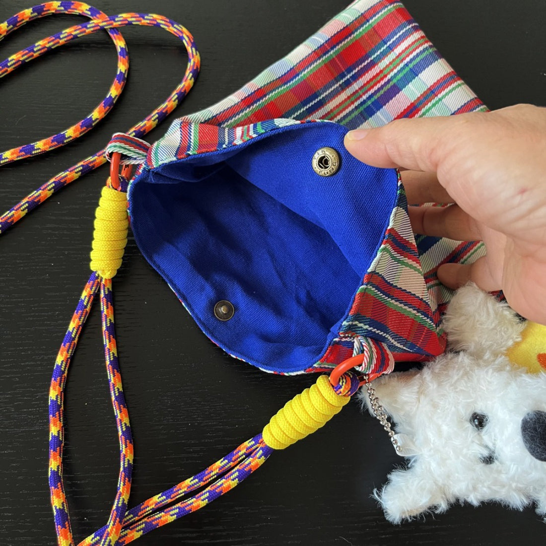 Back view of Cosbai Playful Check Phone Crossbody Bag highlighting smooth fabric and stitching