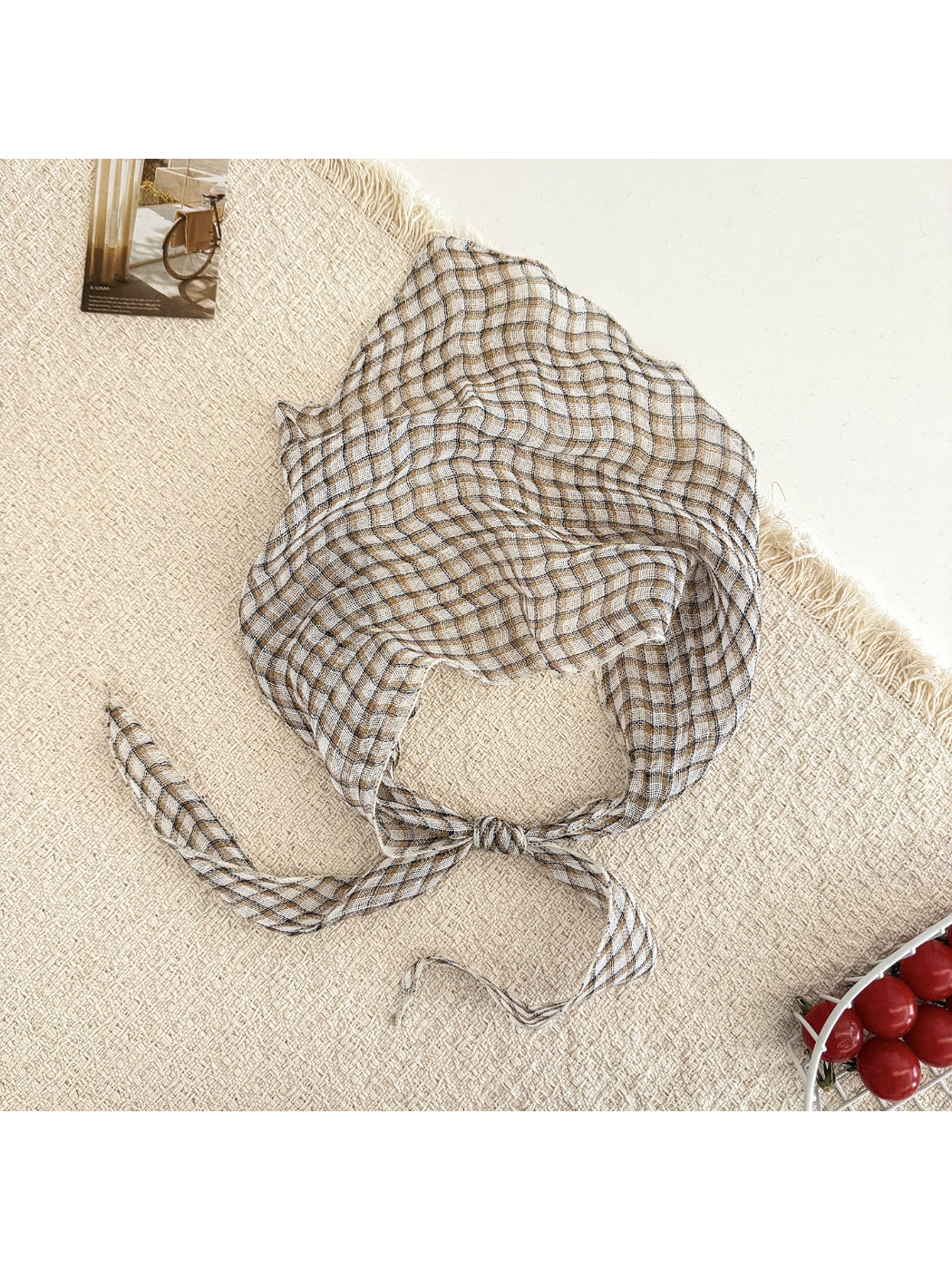 Scarvii casual stripe plaid triangle scarf displayed on wooden surface showing full pattern