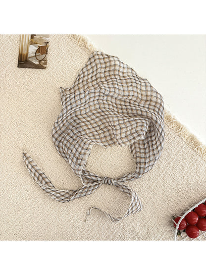 Scarvii casual stripe plaid triangle scarf displayed on wooden surface showing full pattern