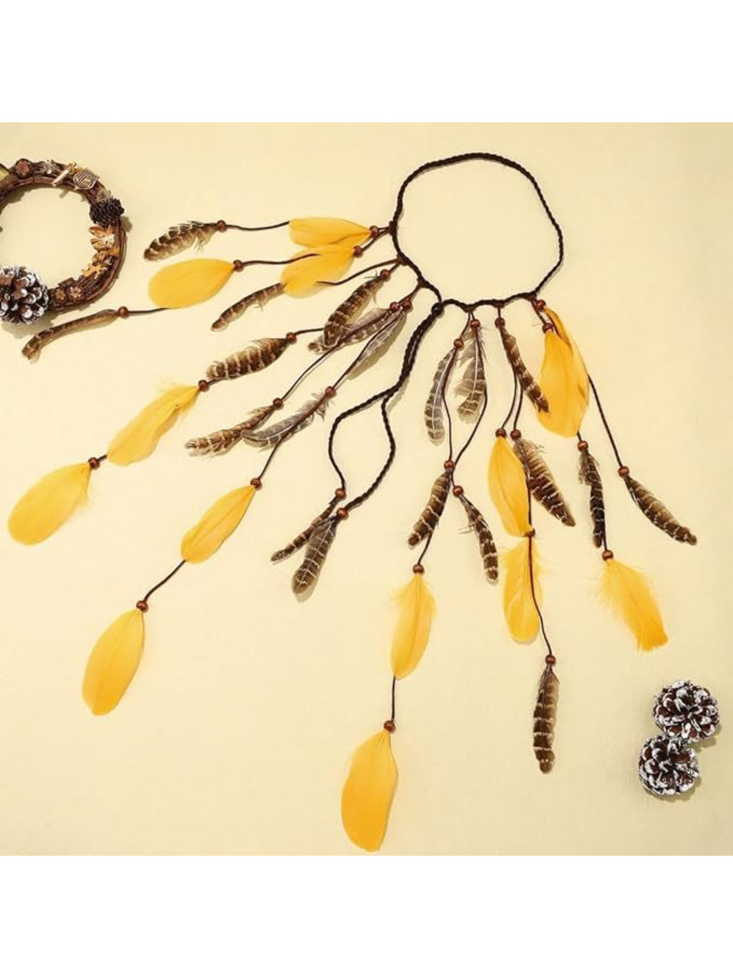 Festival flowing feather hair headpiece with layered feathers in natural tones