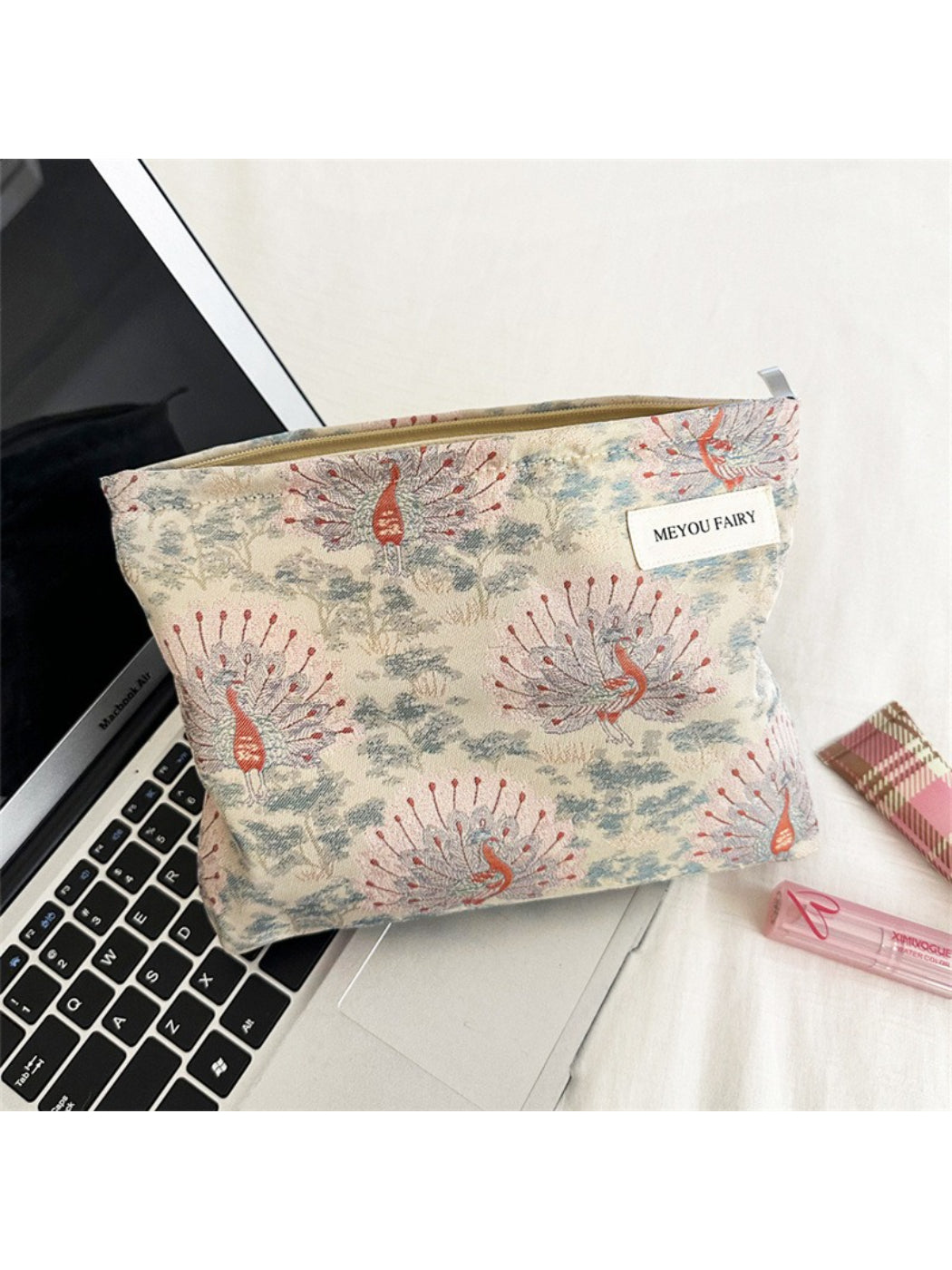 Close-up of and stitching detail on Cosbai Classic Peacock Travel Pouch