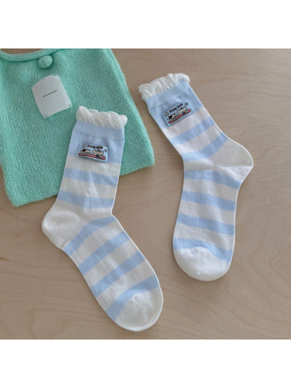 Rufia ribbed socks folded to show soft fabric and patch design