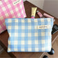 Cosbai pastel check makeup pouch displayed on a white surface