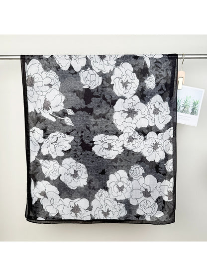Scarvii Statement Flower Wrap Scarf draped over shoulders highlighting large floral motifs