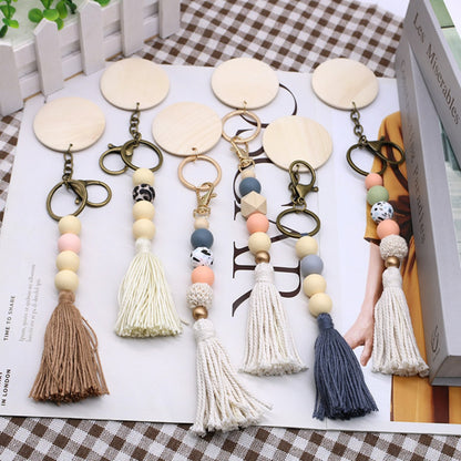 Koco Round Wood Bead Tassel Keychain showing tassel detail