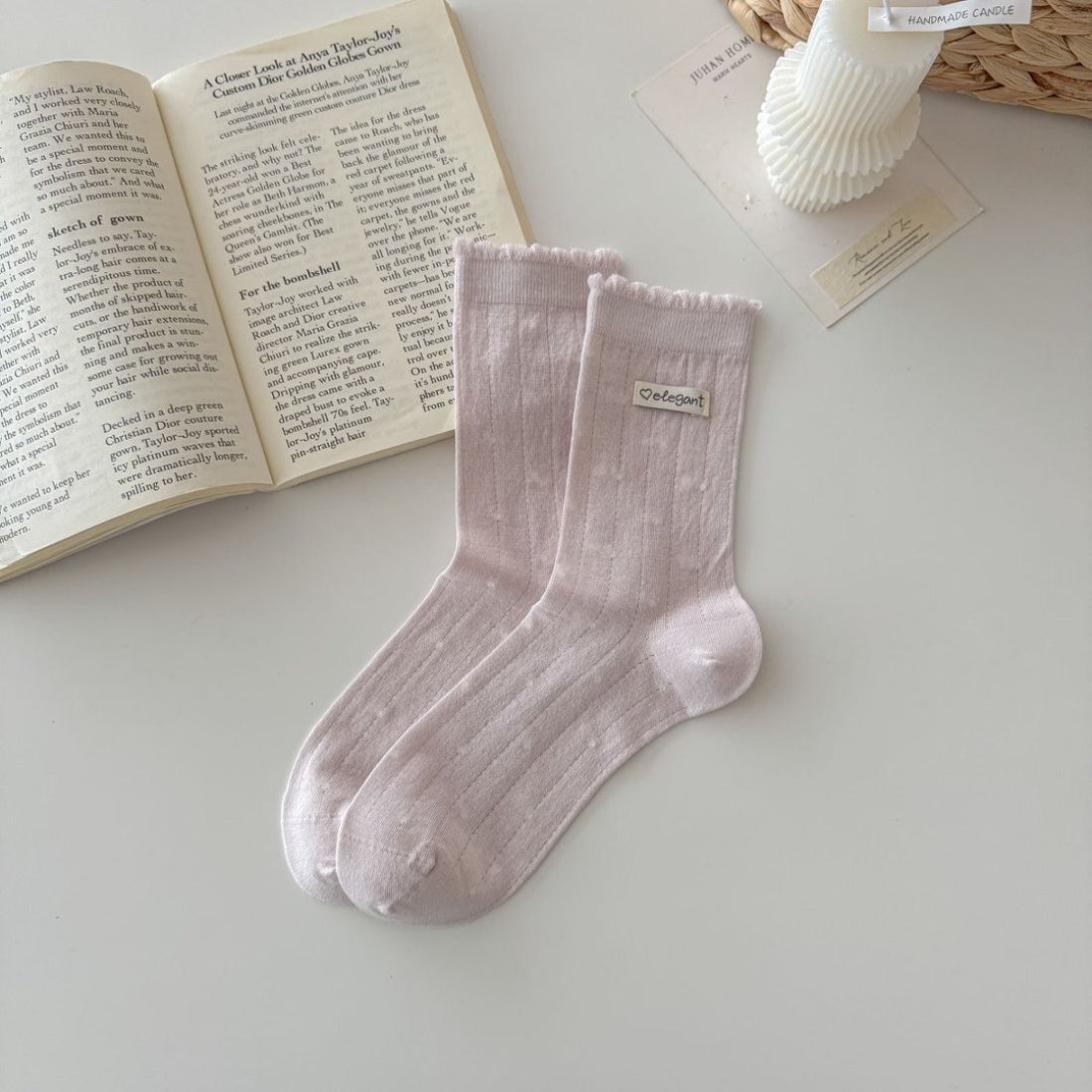 Side view of Rufia soft knit crew socks showing ruffle trim and texture