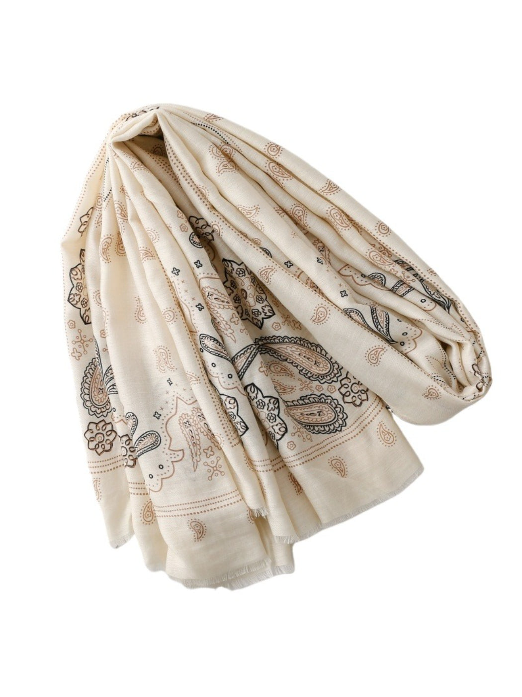 Close-up of scarf fabric highlighting detailed paisley design and texture