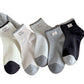Rufia ankle socks displayed flat showing black contrast toe and ribbed fabric