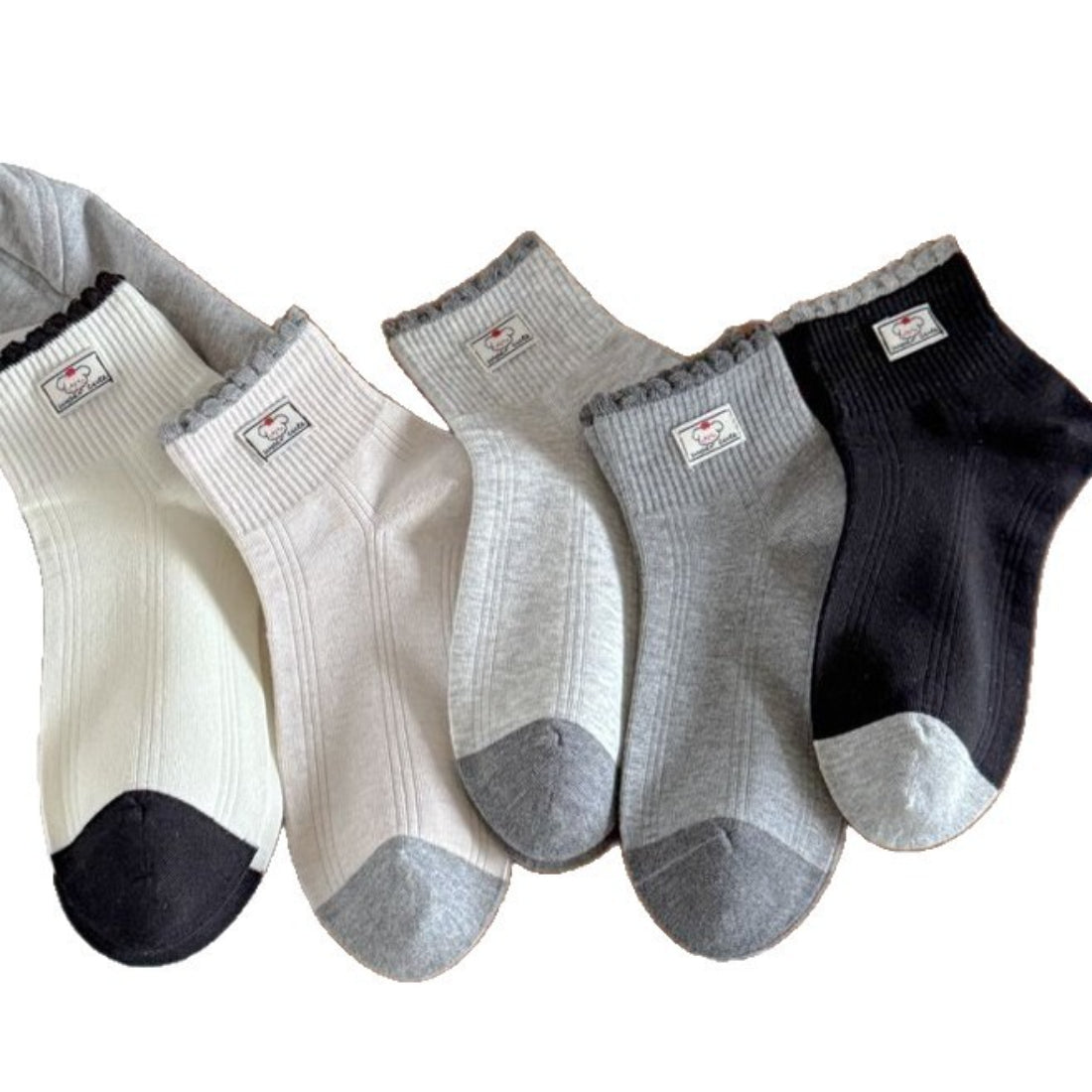 Rufia ankle socks displayed flat showing black contrast toe and ribbed fabric