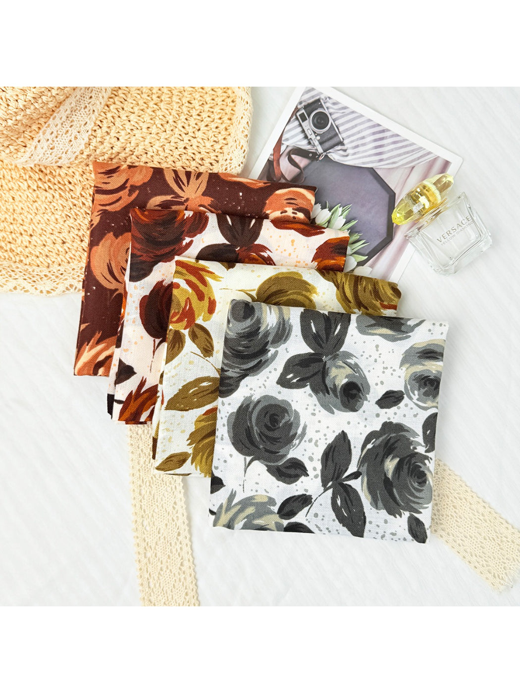 Scarvii rose print scarf styled around a model's neck