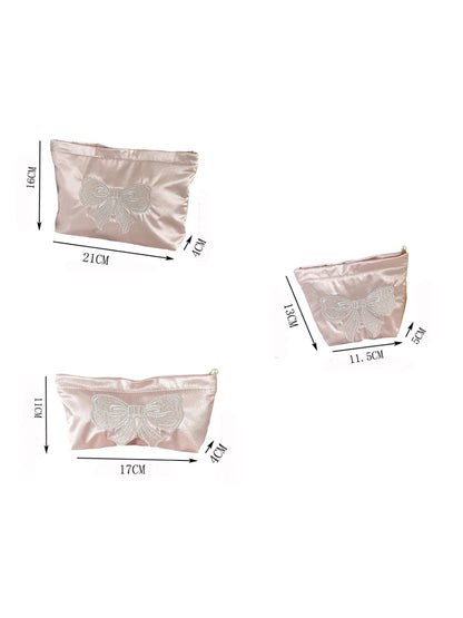 Top view of the Cosbai elegant bow cosmetic pouch partially open