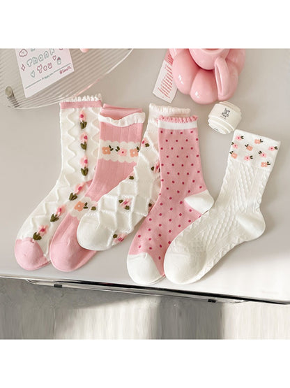 Close-up of Rufia pink floral ribbed crew sock showing ribbed texture and flower pattern