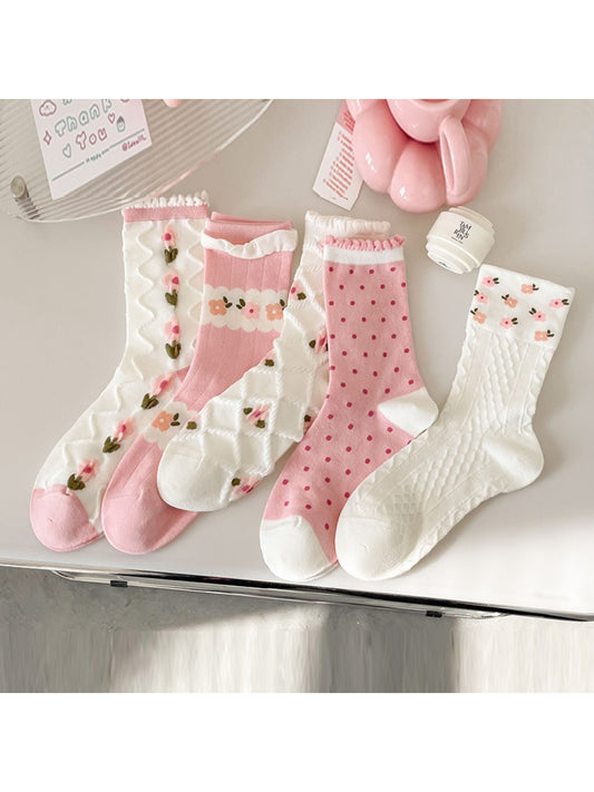 Close-up of Rufia pink floral ribbed crew sock showing ribbed texture and flower pattern