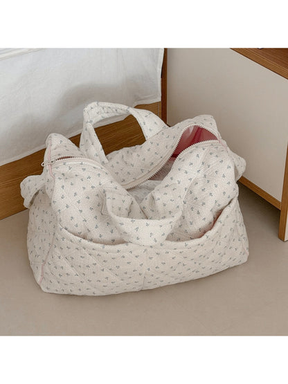 Cosbai padded travel bag with floral pattern on white background