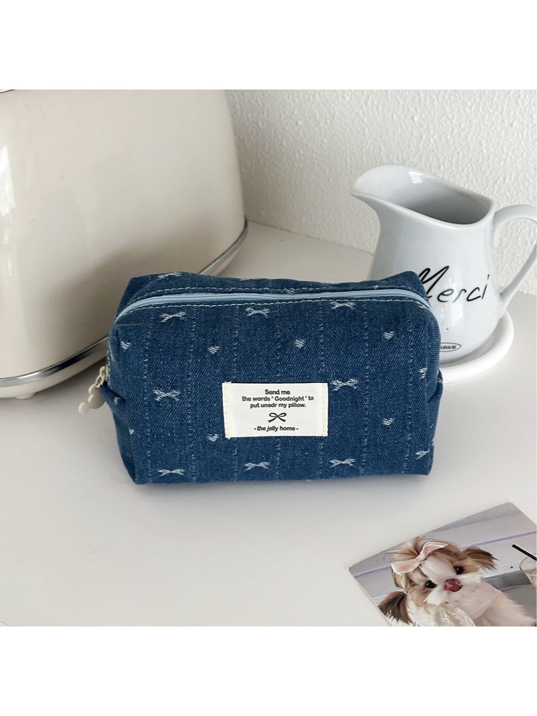 Cosbai soft washed denim makeup pouch on a white background