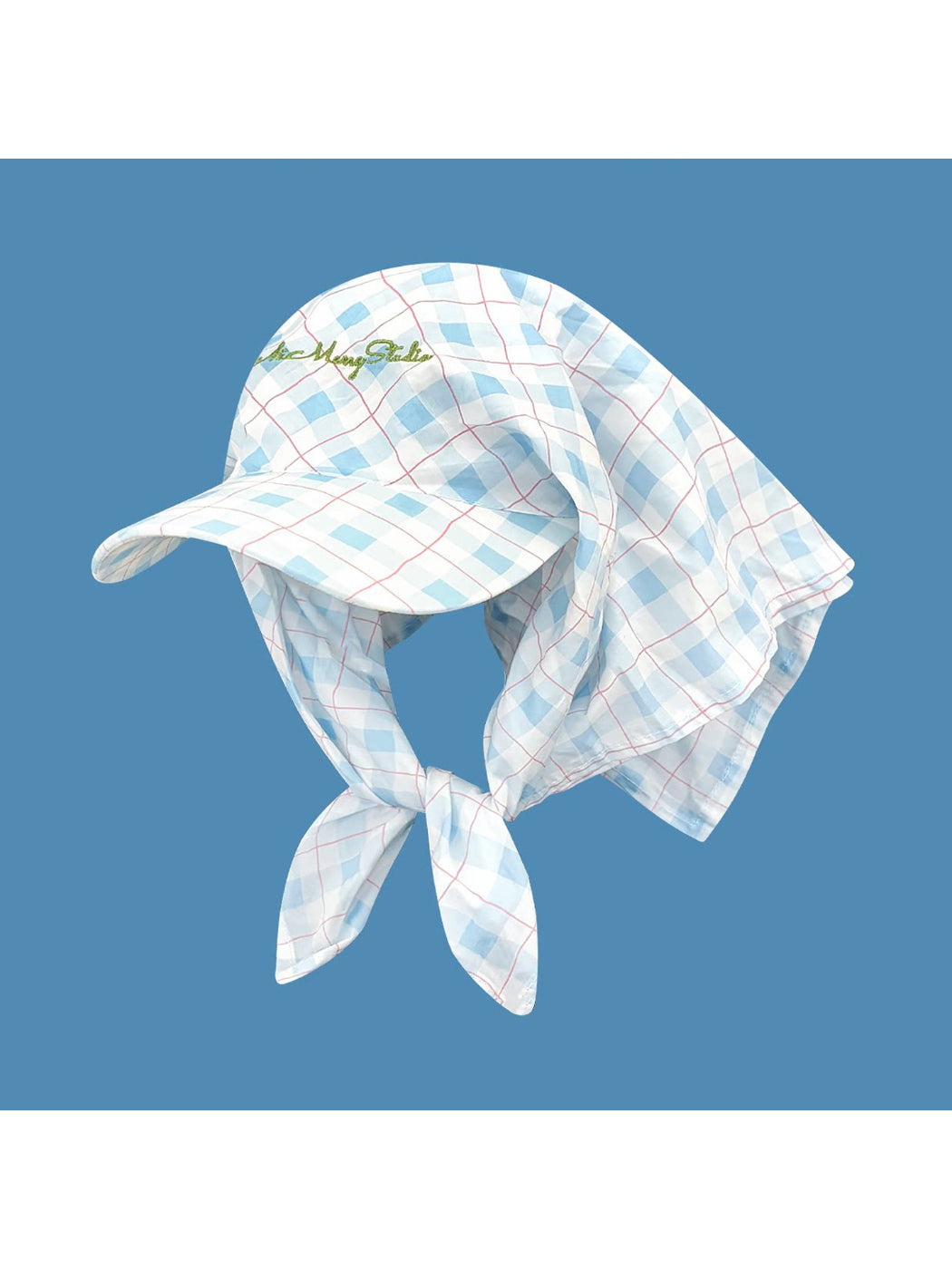 Front view of Haila plaid tie back visor cap showing checkered pattern