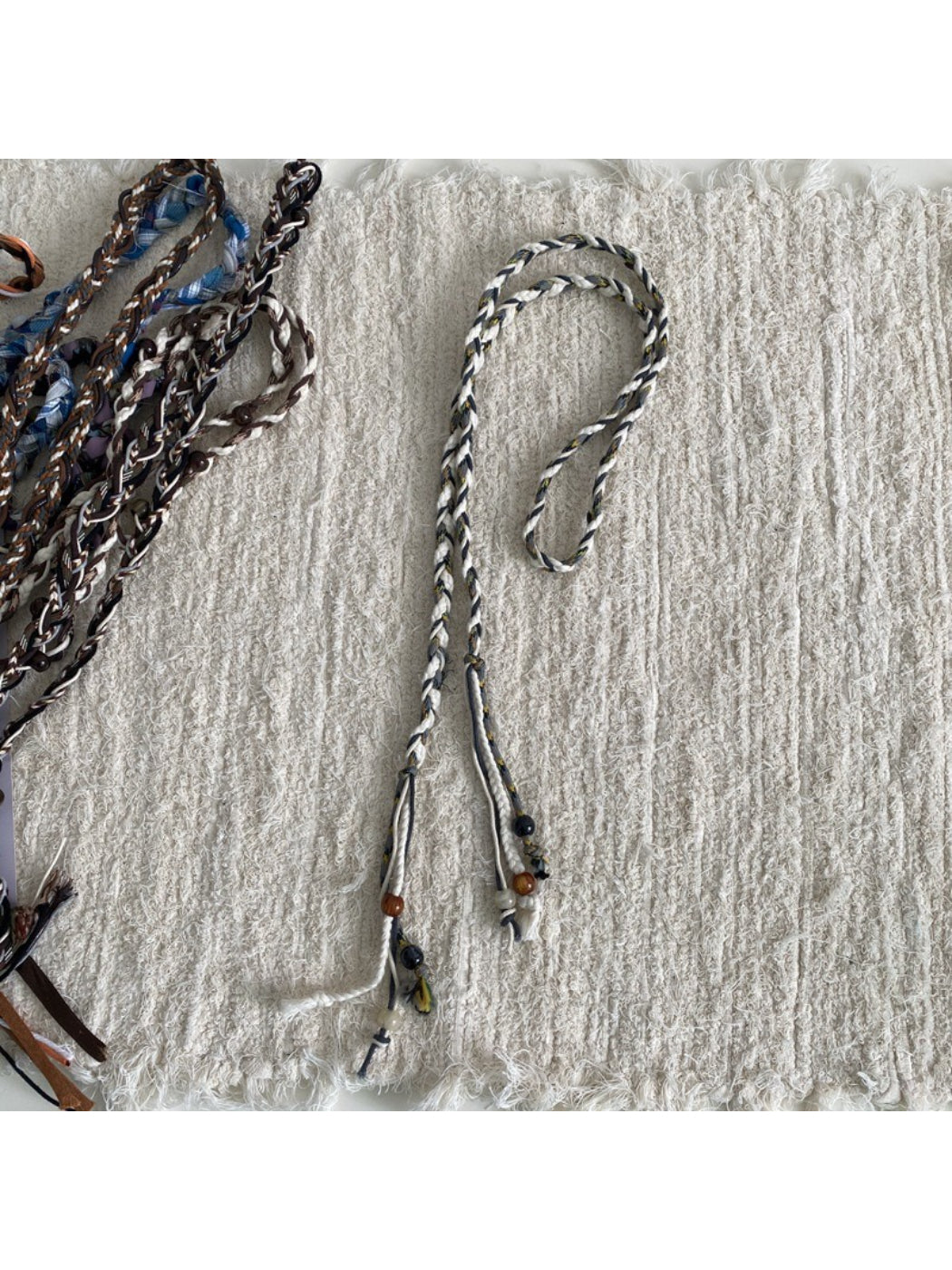 Side view of Beco casual braided waist belt highlighting buckle design