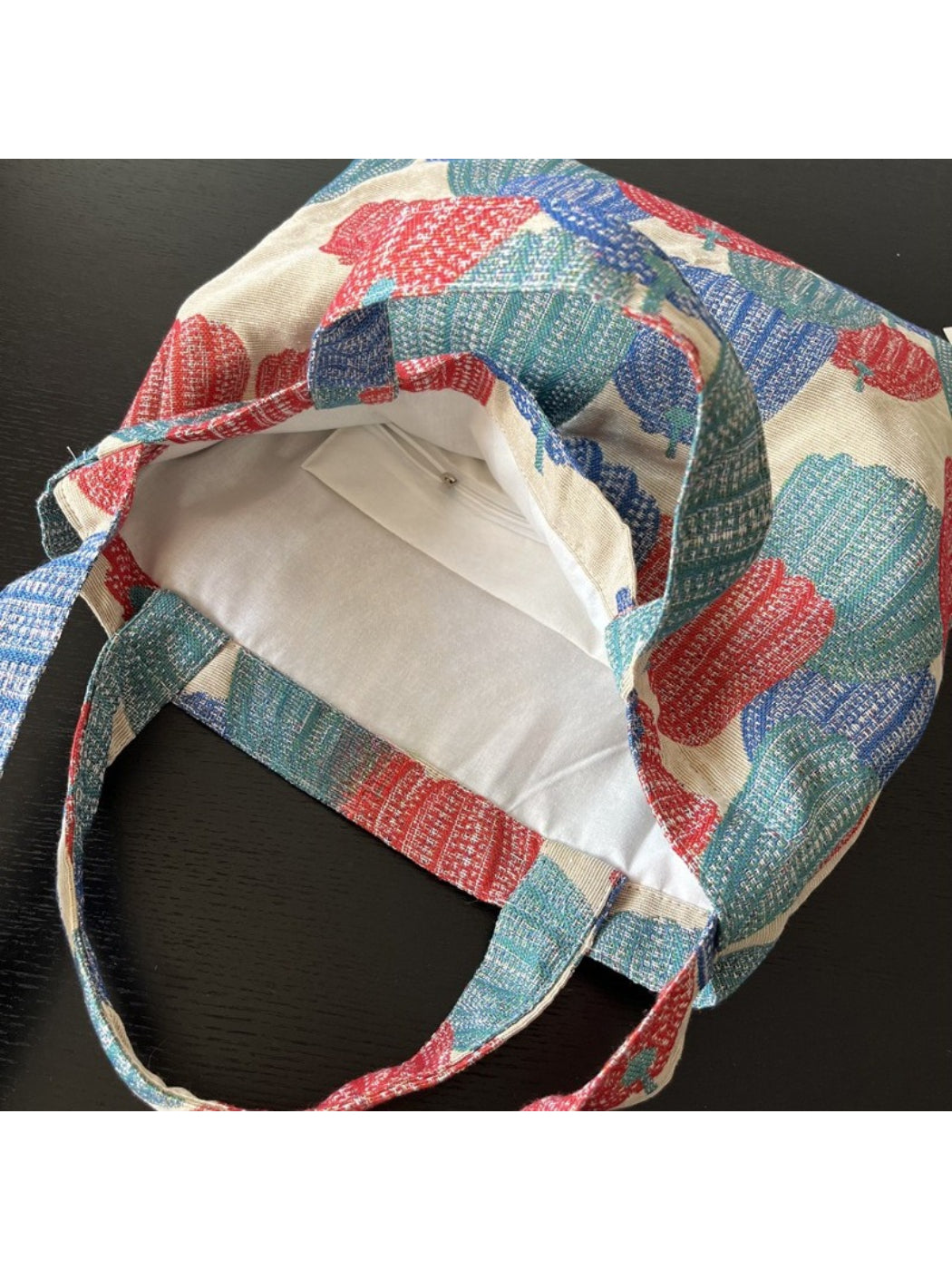 Top view of Cosbai vintage pumpkin shoulder tote highlighting and interior lining