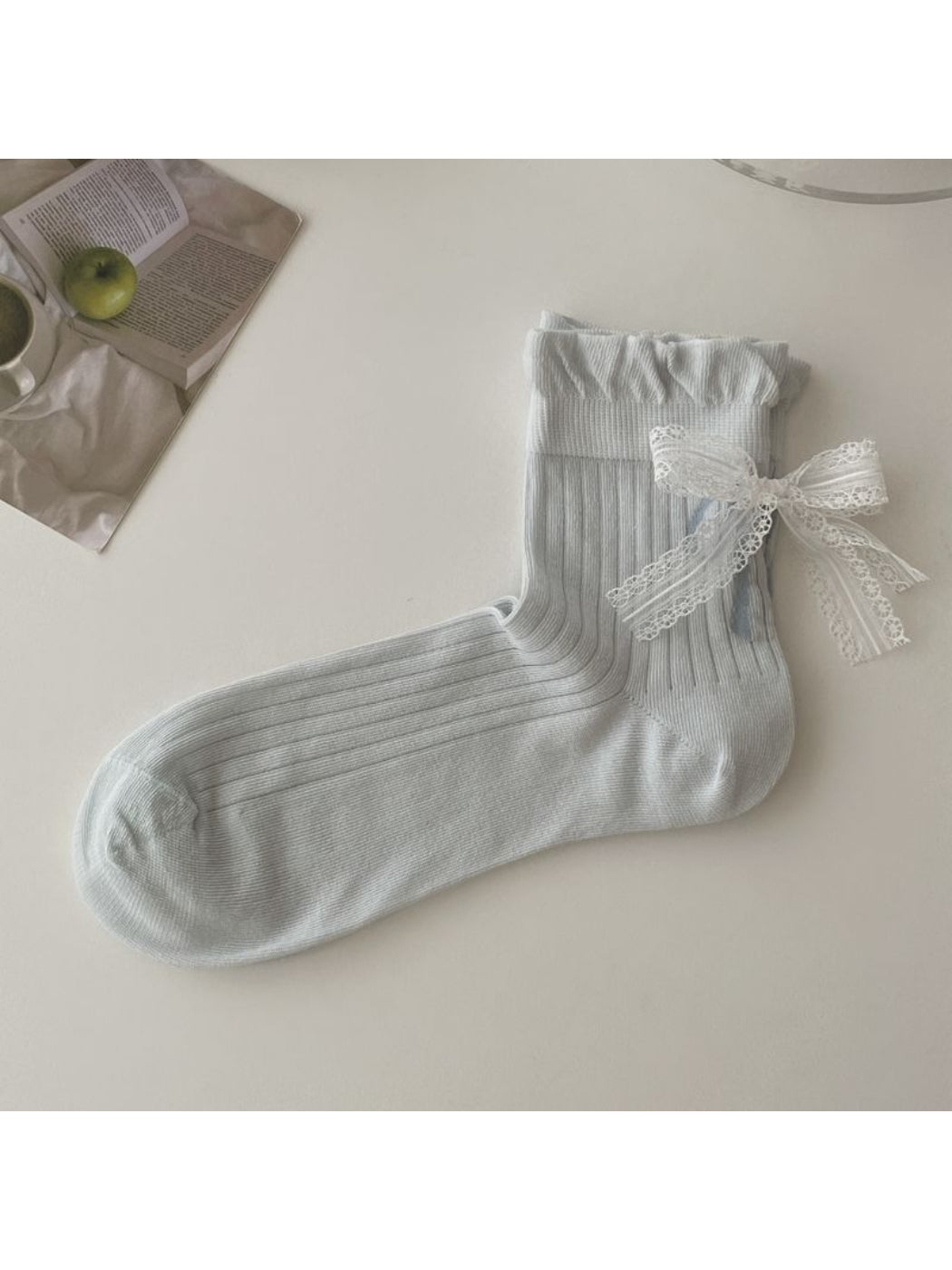 Model wearing Rufia girly contrast detail socks with casual shoes