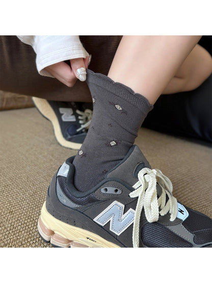 Rufia Classic Floral Knit Crew Socks worn with casual shoes and rolled-up jeans