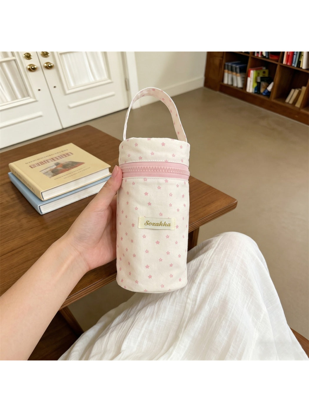 Top view of Cosbai star print pencil pouch partially open