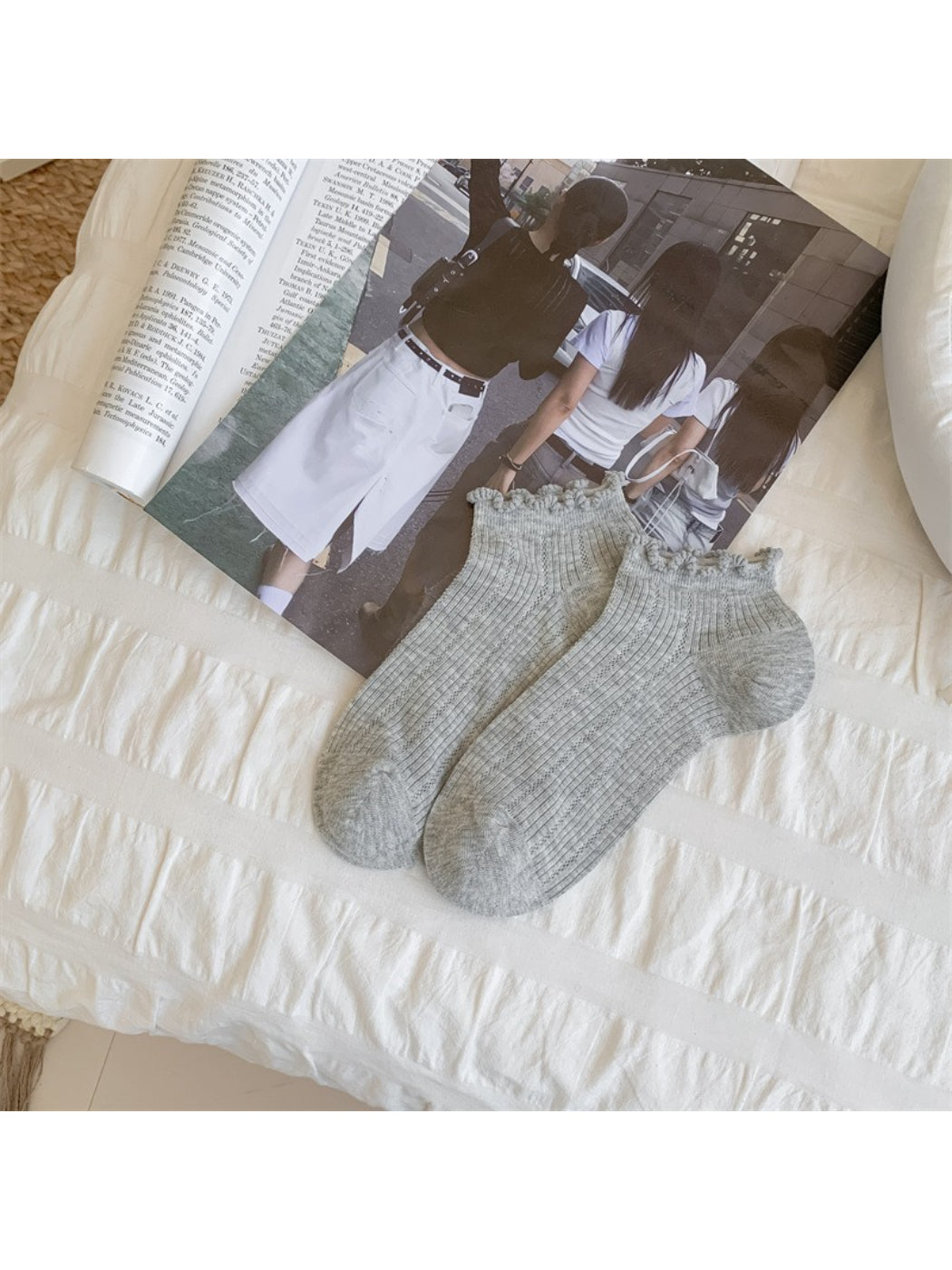 Rufia ankle socks paired with casual shoes, showing fit and trim detail