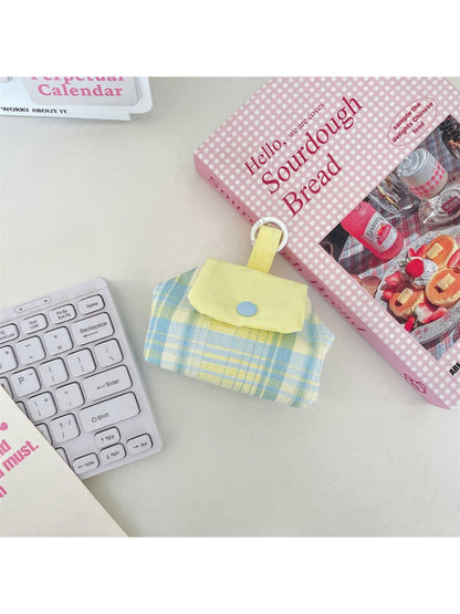 Close-up of Cosbai mini polka dot pouch bag zipper and fabric texture