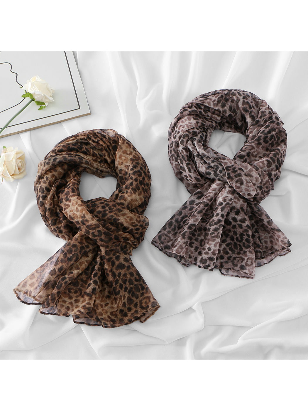 Close-up of lightweight fabric showing leopard spots on scarf