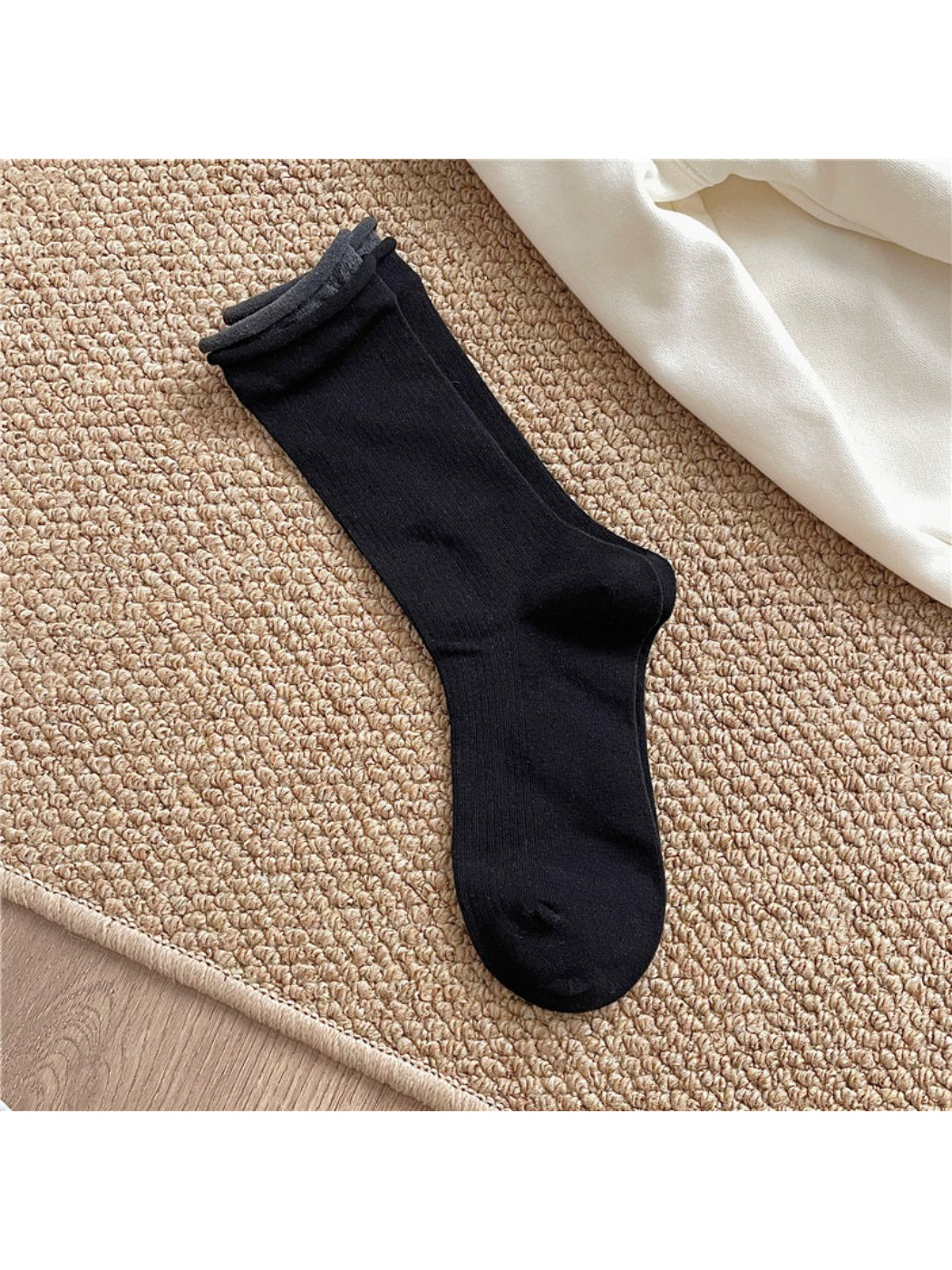 Close-up of Rufia casual roll cuff crew sock fabric texture in gray