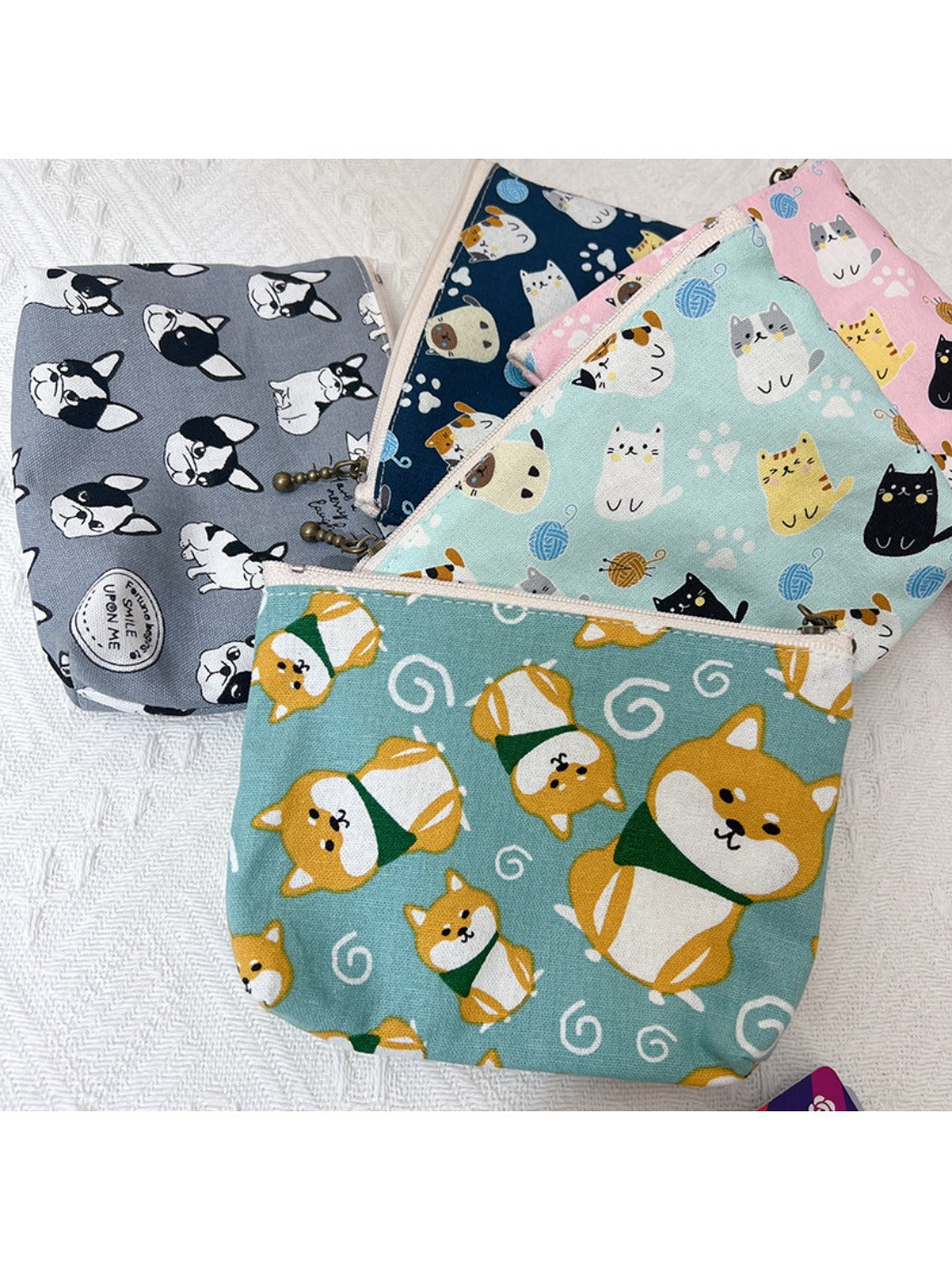 Cosbai coin purse featuring a colorful cartoon character print