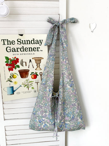 Cosbai tote bag worn over shoulder showcasing its casual boho style