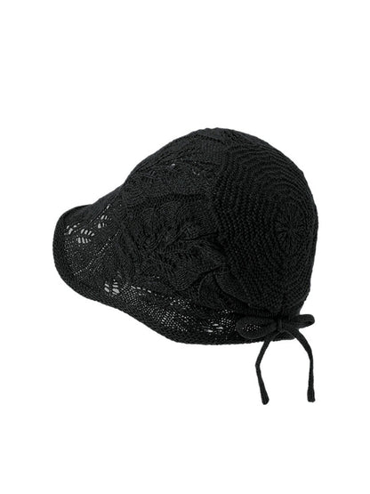 Side view of Haila open knit tie back hat in beige