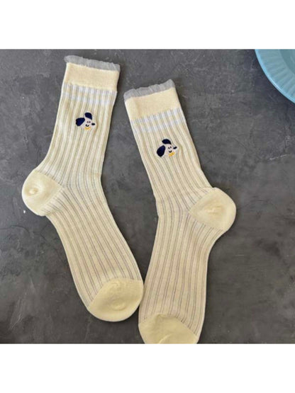 Rufia Playful Pup Everyday Socks displayed with matching casual outfit and accessories