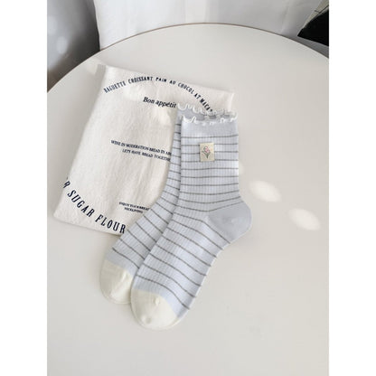 Rufia Lettuce Edge Stripe Crew Socks displayed with packaging
