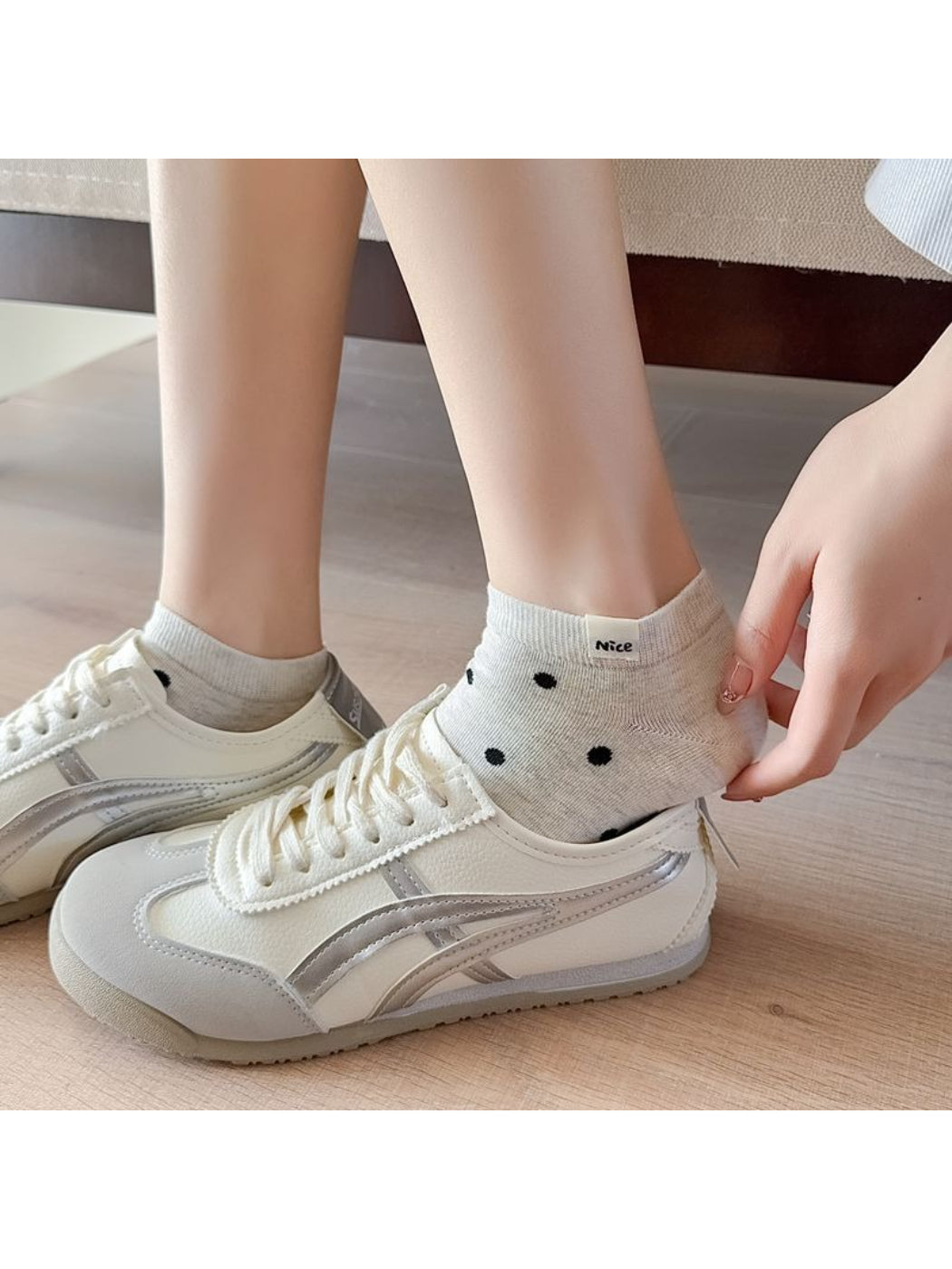 Rufia Everyday Polka Dot Socks arranged in a stack showing multiple pairs