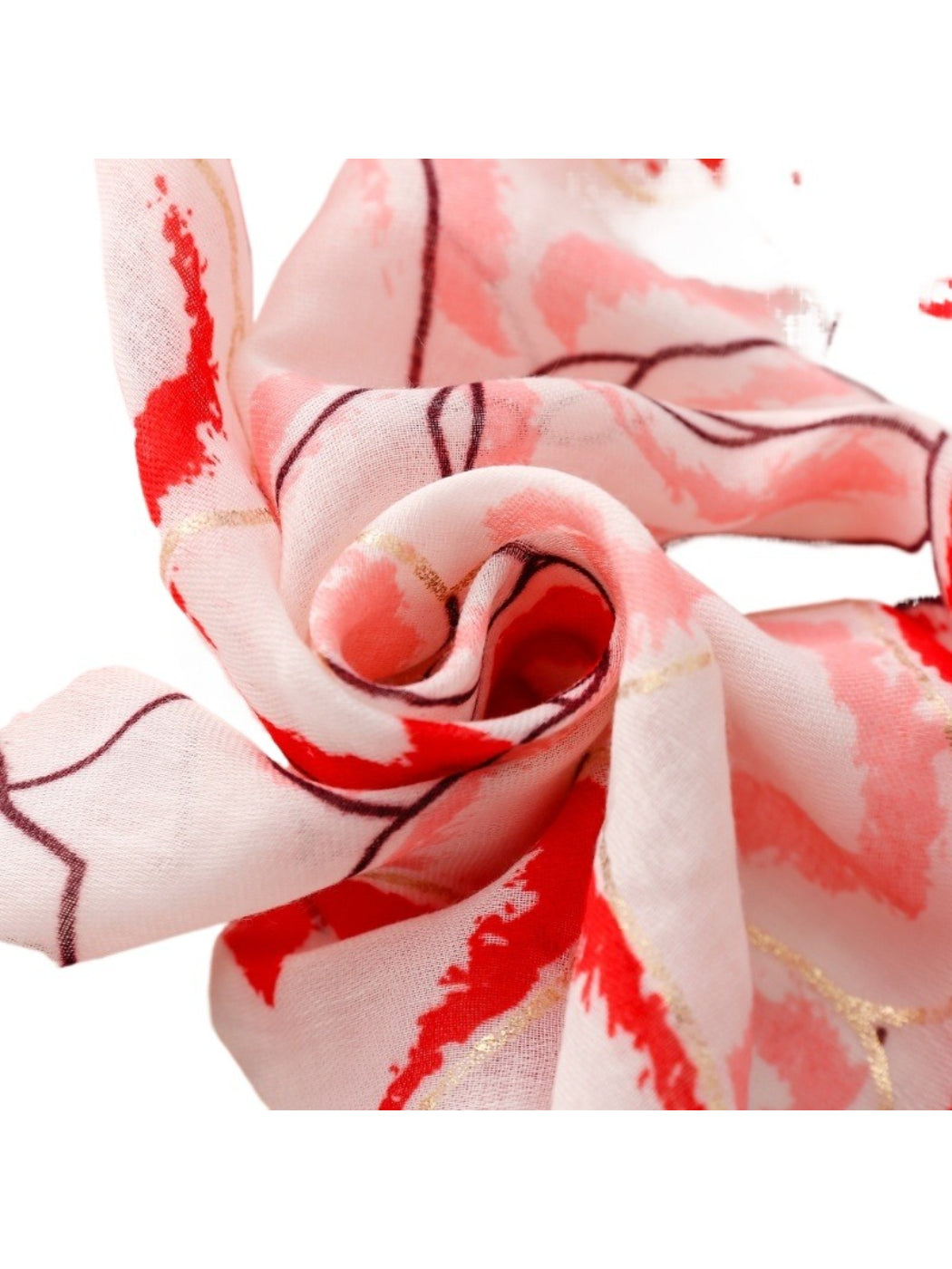 Pink Petal Statement Scarf draped over a chair showcasing its length and pattern