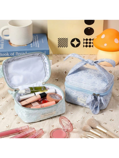 Side view of Cosbai Bow Top Handle Makeup Case showing the handle and bow design