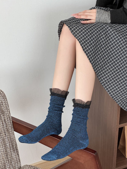 Rufia blue sparkle trim crew socks worn with skirt