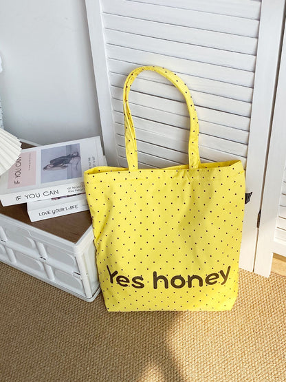 Cosbai Dot Print Graphic Tote Bag hanging on a hook with visible handle details