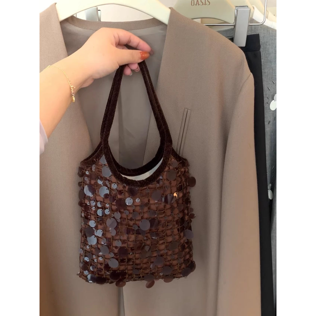 Cosbai chocolate brown mini handbag covered in shiny sequins with a gold chain strap
