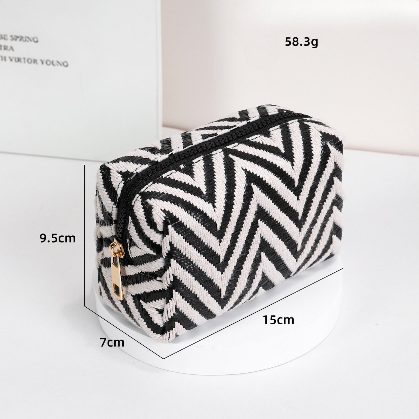 Cosbai cosmetic pouch with zigzag design placed on flat surface