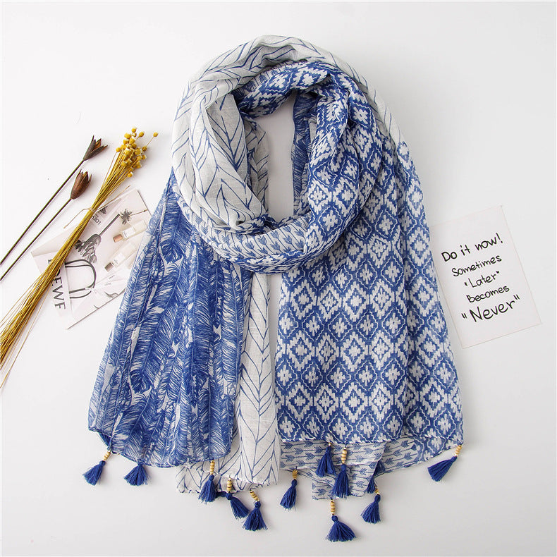 Blue feather and geometric print shawl with beaded tassels