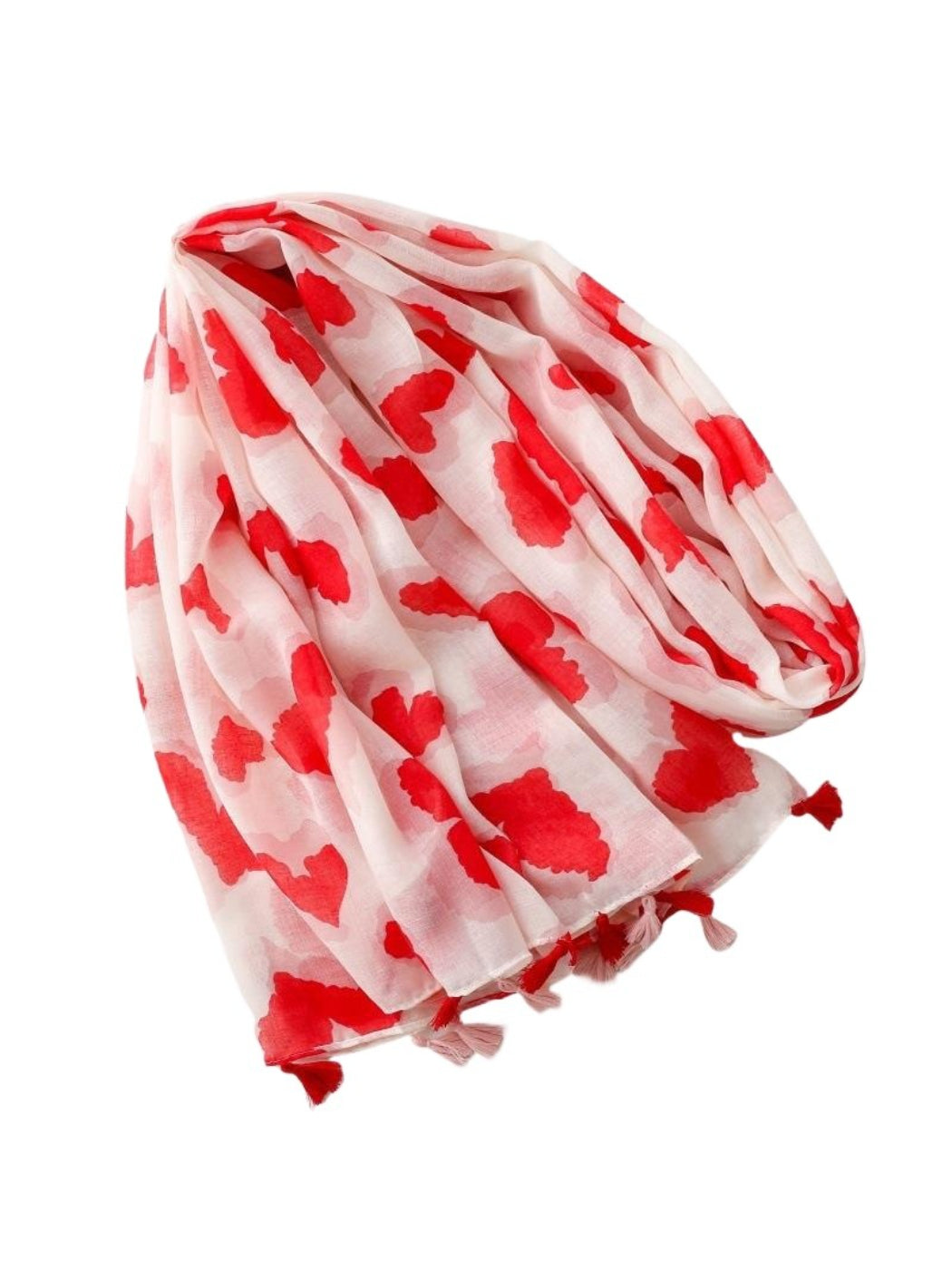 Scarvii Heart Print Tassel Scarf draped over chair highlighting texture and pattern
