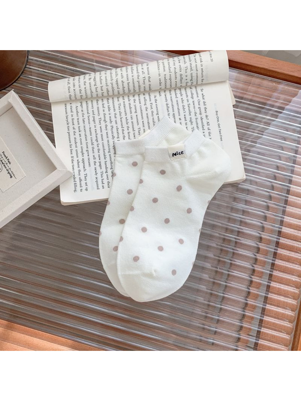 Model wearing Rufia Everyday Polka Dot Socks paired with casual shoes