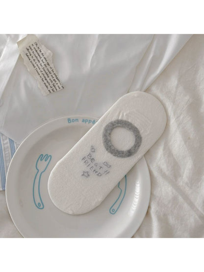 Close-up of Rufia invisible sock heel area showing visible stitching and puppy print